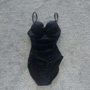 assets by spanx black one piece padded push ip swim suit. bathing suit. small